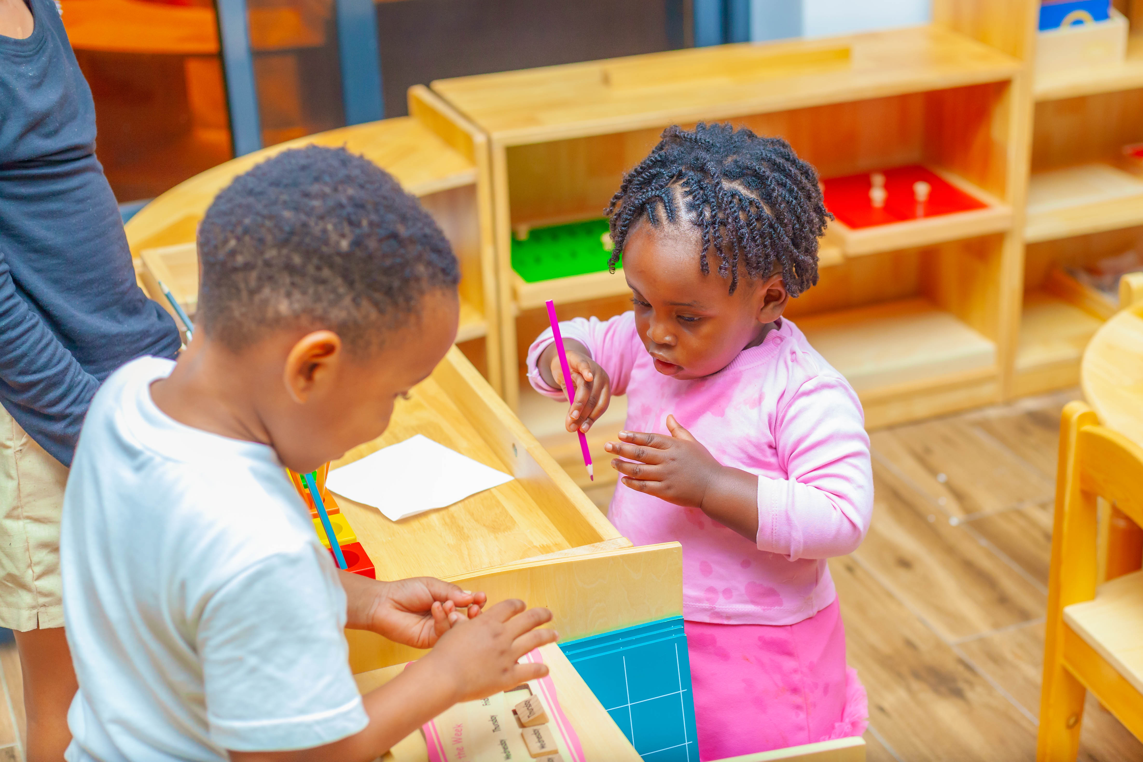 Founder holding child